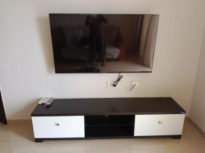 AC 1bhk furnished flat towards highway view in Lodha Belmondo, Pune